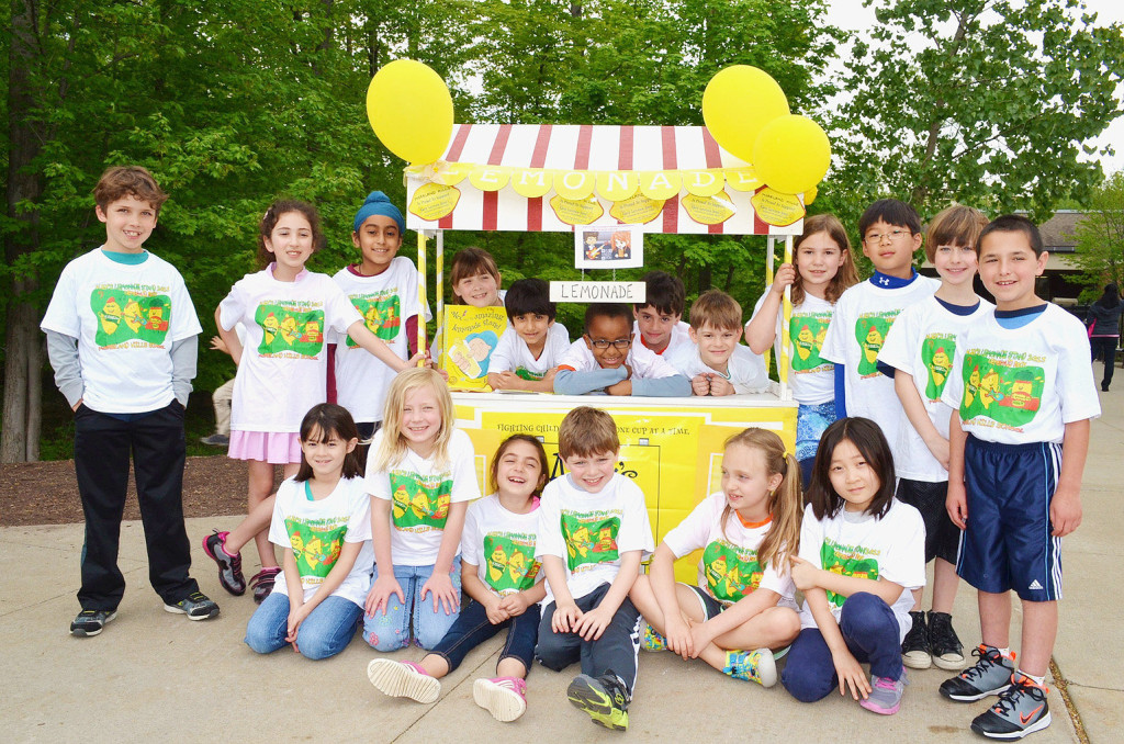 Second graders from Moreland Hills Elementary raise $2,000 for pediatric cancer selling lemonade at Alex's Lemonade Stand. 