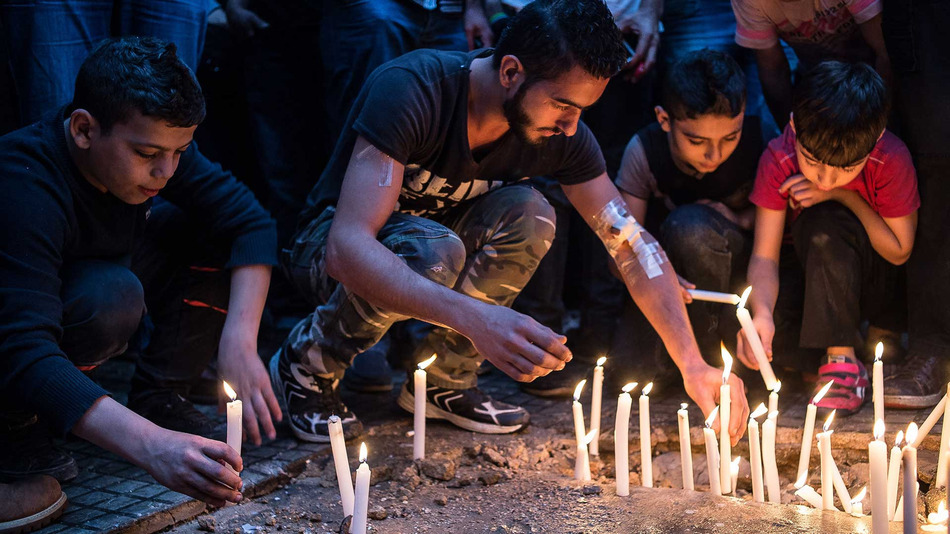 A Beirut vigil in the southern suburb of Dahieh for victims of the deadly attacks on Nov. 12, where 44 people died and over 200 were wounded. These events have been overshadowed by the tragedy in Paris, which happened the following day and raises questions about West racism.